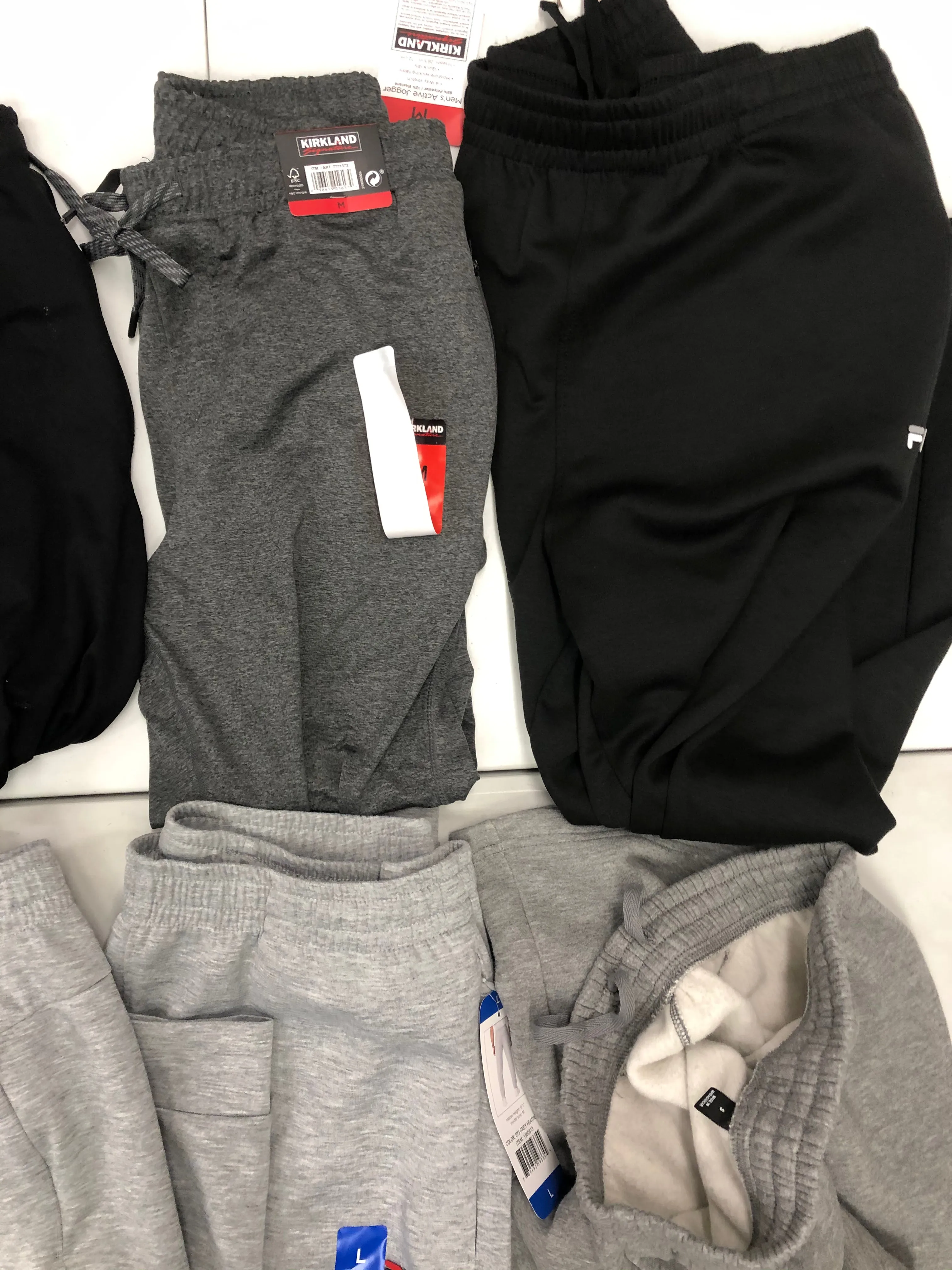 Men's Clothing Sweatpants and more Wholesale Lot, FILA, EDDIE BAUER, STEVE MADDEN, KIRKLAND and more, 8 items, Shelf Pulls, MSRP $381